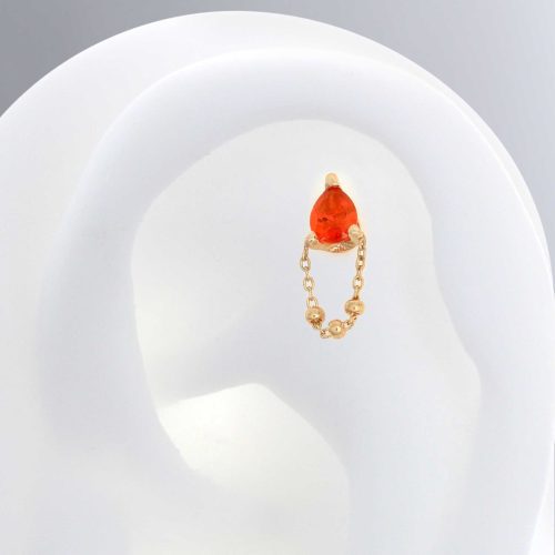 1005earcopy pupilhall earring bodyjewelry cartilagejewelry nosepiercing orangesapphire